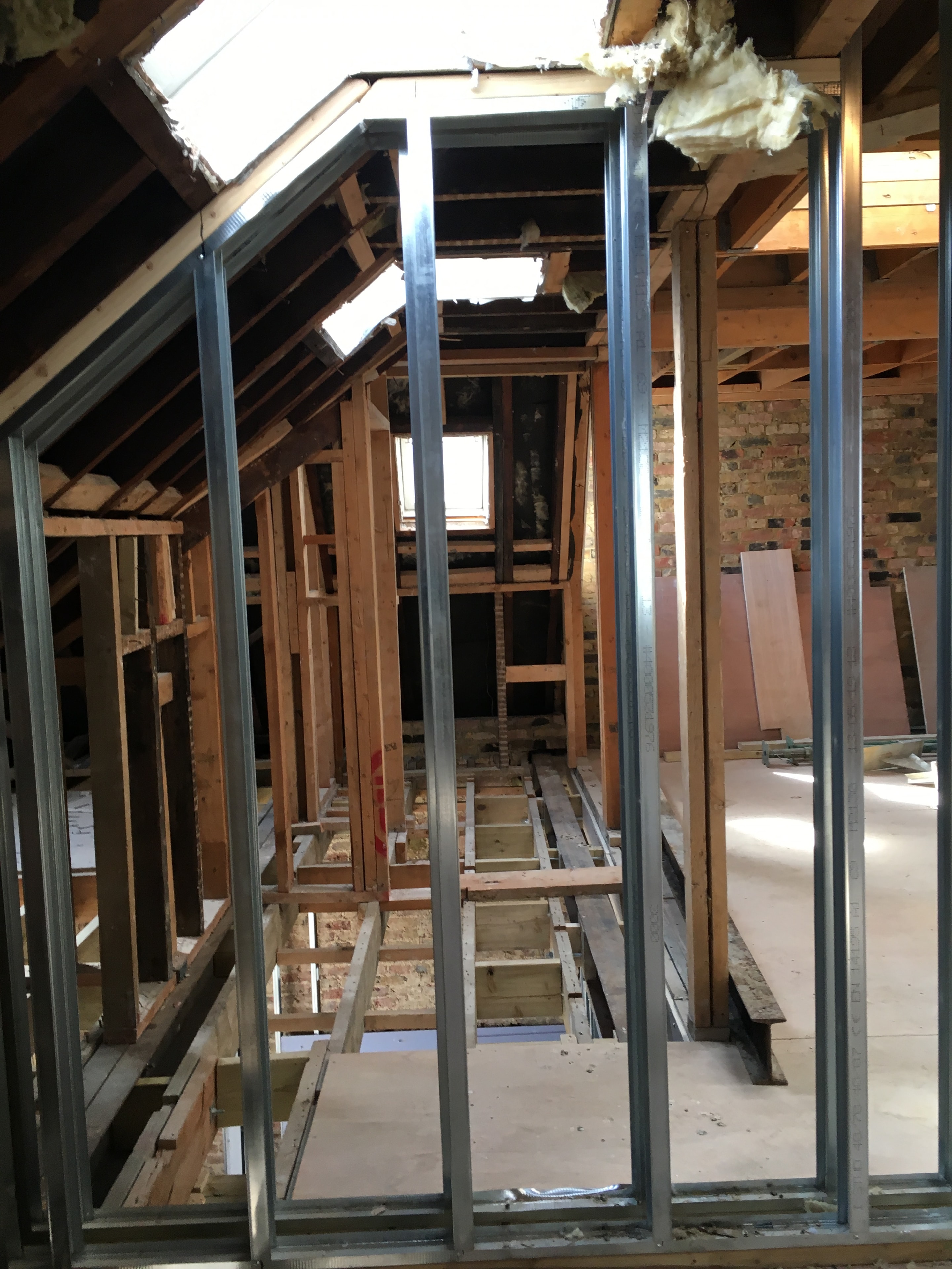 Gordon Road Ealing — interior steel framing looking through the building during conversion works