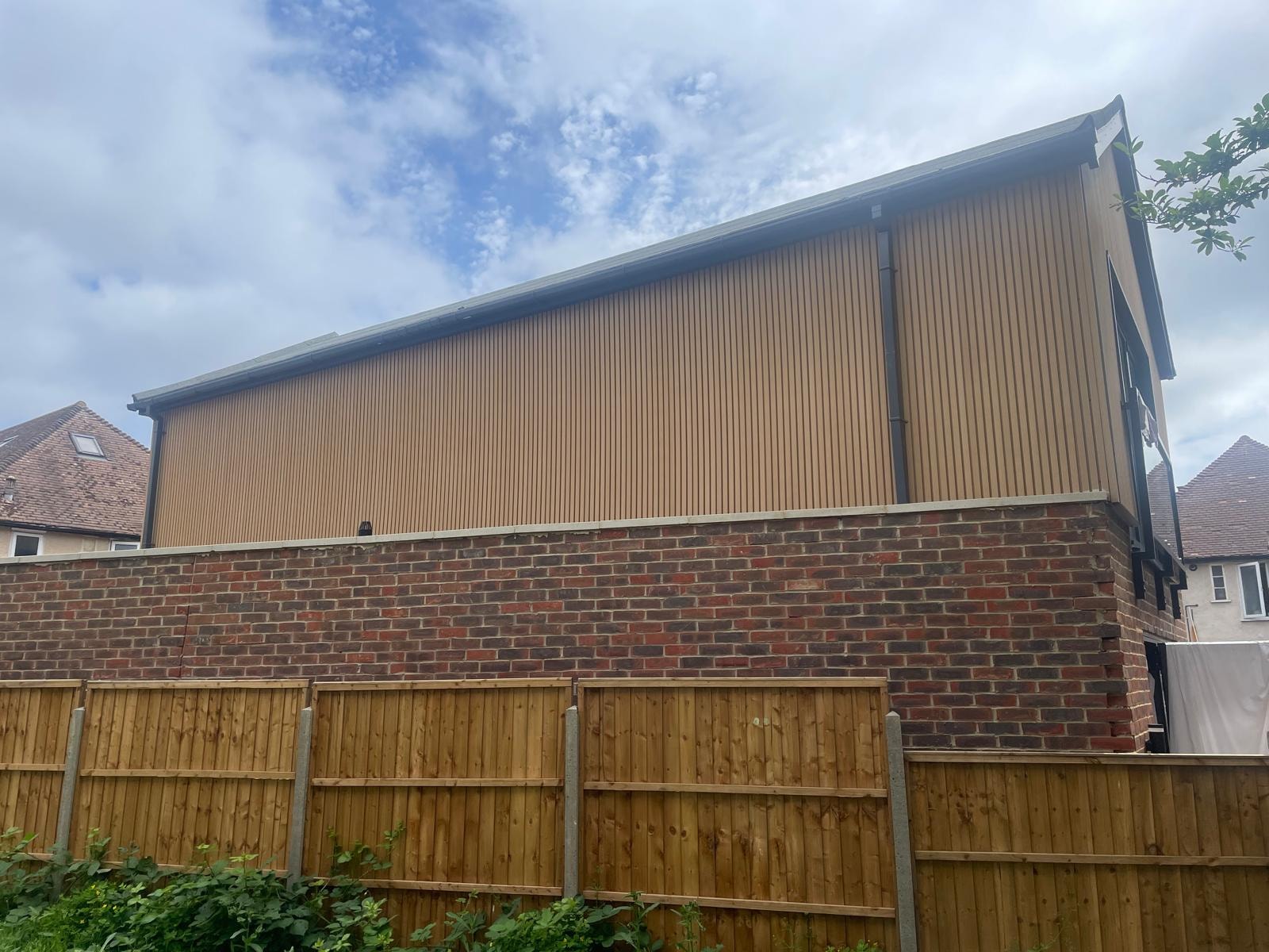 Harrow Road — existing brick garage structure on site before demolition
