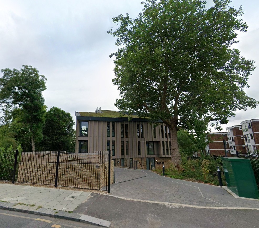 Ravensbourne Park — completed building from street showing timber cladding and entrance
