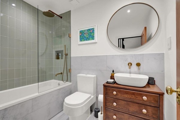 Salisbury Road — bathroom with wooden vanity