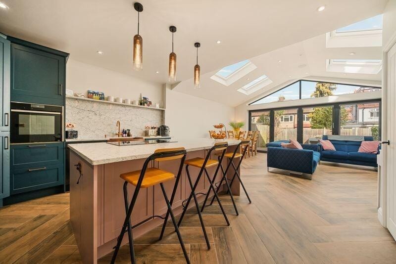 Contemporary luxury residential interior with large glazed wall and natural light